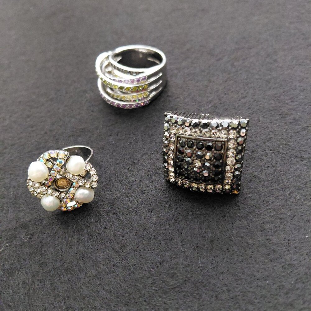 A stunning trio of cocktail rings.  Make an eye-catching statement.